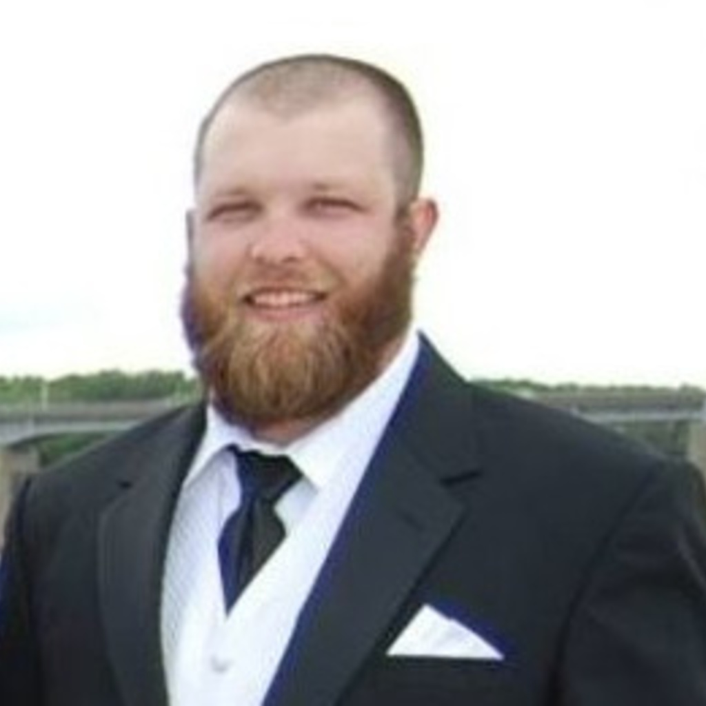 very dated photo of Brian Todd
