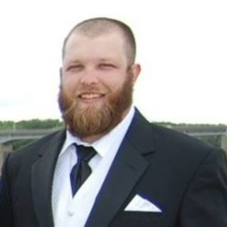 very dated photo of Brian Todd